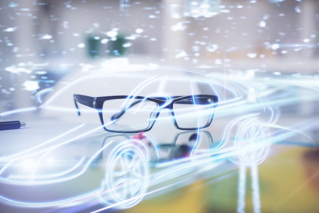 automobile theme hologram with glasses on the table background autopilot concept double exposure