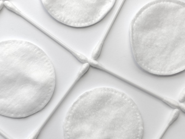 background cotton swabs and cotton pads cosmetic products for cleaning and hygiene of the face femal