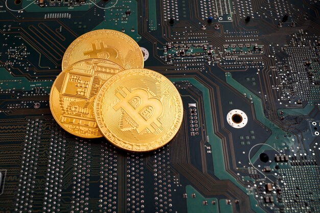 Bit coins on the background of a computer microcircuit