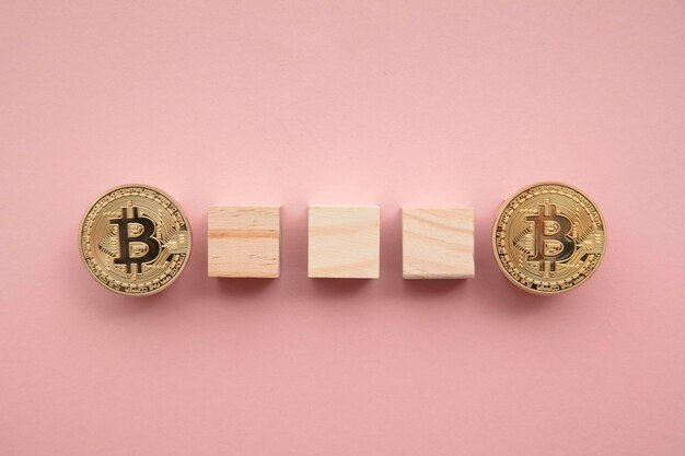 Bitcoin cryptocurrency coin blockchain technology concept coin with wood block