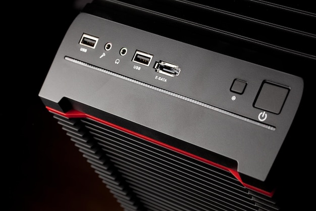 Black computer box on dark background