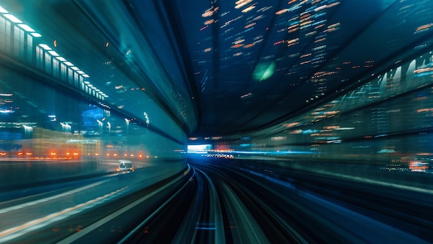 Blurred motion of illuminated railroad tracks at night
