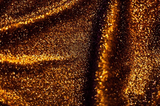 Bronze holiday sparkling glitter abstract background luxury shiny fabric material for glamour design and festive invitation