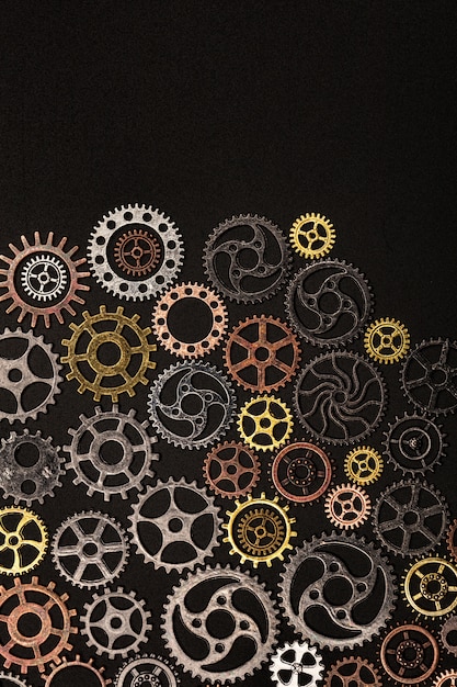 Bunch of cogwheels on a black background.