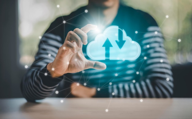 Business holding cloud networking concept and touch screen with hand connection line on the black background, Cloud computing is a system for sharing download and upload big data information, concept