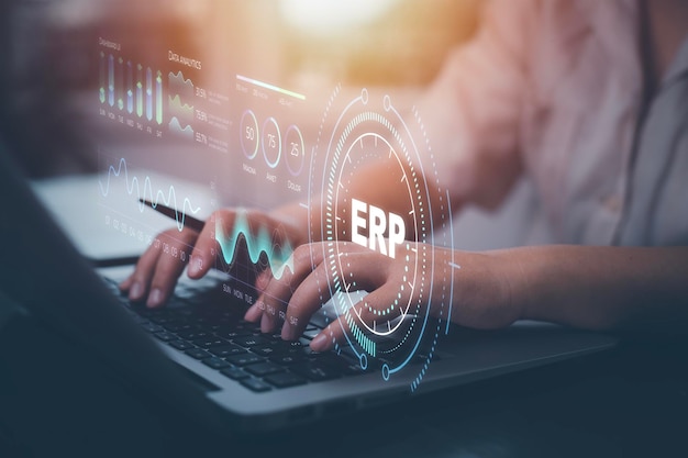 Business people using a laptop with document management for ERP Enterprise resource planning conceptEnterprise Resource Management ERP software system for business resources plan presented