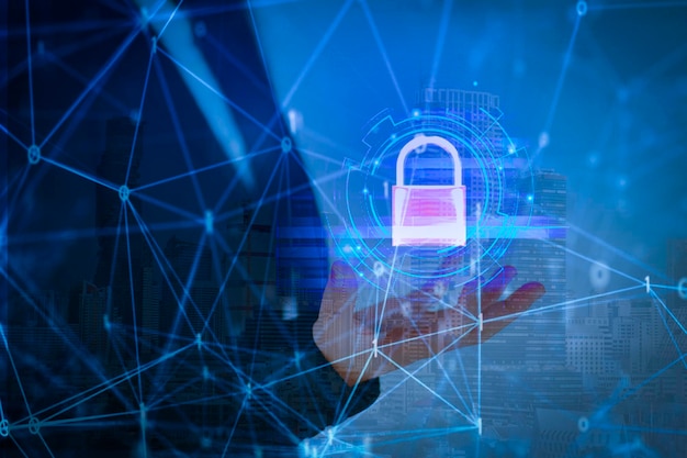 Business woman with data security systems computer with locked padlock on data network for protect crime by an anonymous hacker internet technology background cyber security concept