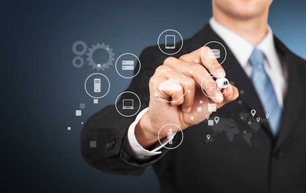 Businessman hand working with a Cloud Computing diagram on the new computer interface
