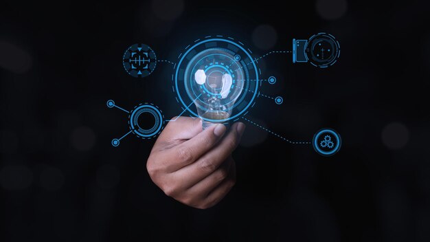 Businessman holding glowing light bulb with digital transformation change management internet of things