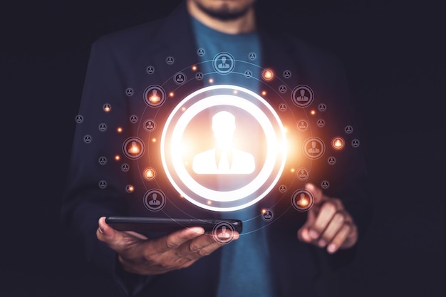 businessman touching on screen to target customer crm customer relationship management