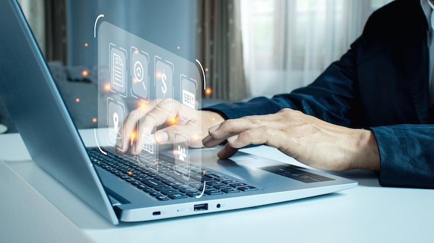 Businessman using a computer for property sales listings realtor agency contractor