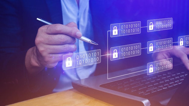 Businessman using a laptop computer to Blockchain technology concept with chain of encrypted blocks to secure cryptocurrencies and bitcoin for online payments and money transaction