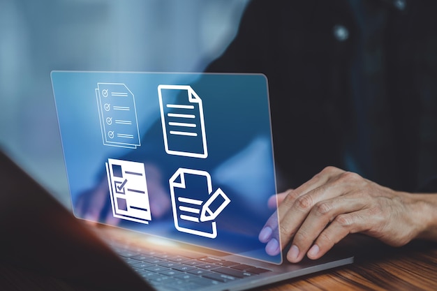 Businessman using computer Document Management System DMS online documentation database process automation to efficiently manage files