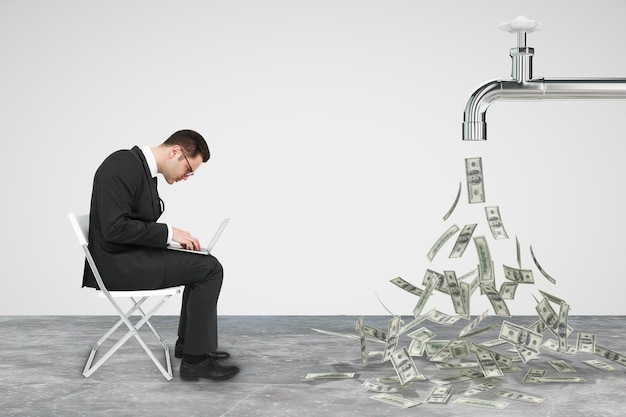 businessman working opposite flow of dollars from the faucet concept