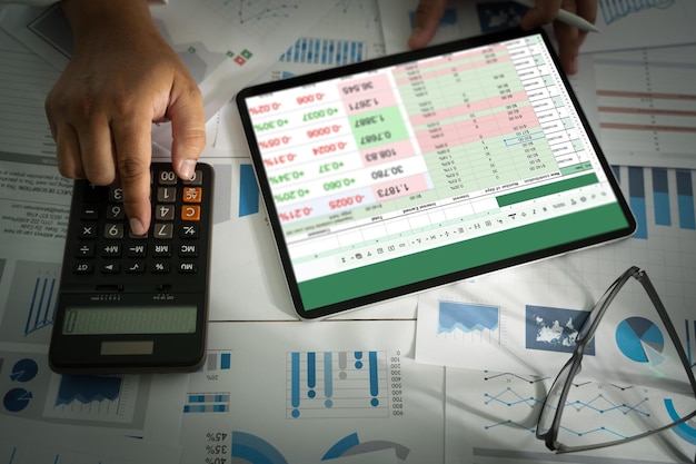 businessman working with data and graphs in spreadsheet documents for online analysis microsoft excel project dashboard accounting digital