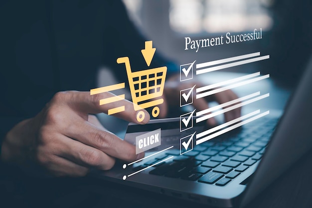 businessman works laptop with online shopping concept marketplace website with virtual interface of online shopping cart part of the network online shopping business with selecting shopping cart