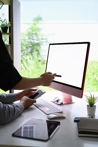 Businesspeople working together in bright office room