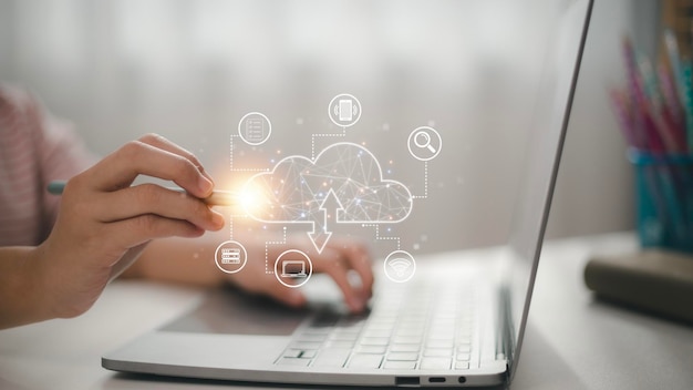 Businesswoman hand working with a Cloud Computing diagram on the new computer interface as concept