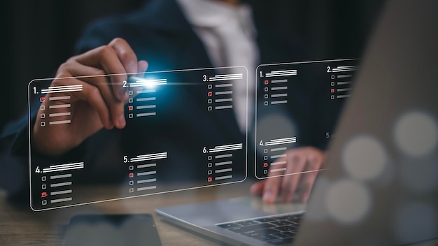 Businesswomen tick mark an assessment questionnaire evaluation online survey online exam choose the right answer in the exam and fill out an online survey form Answer the test questions concept