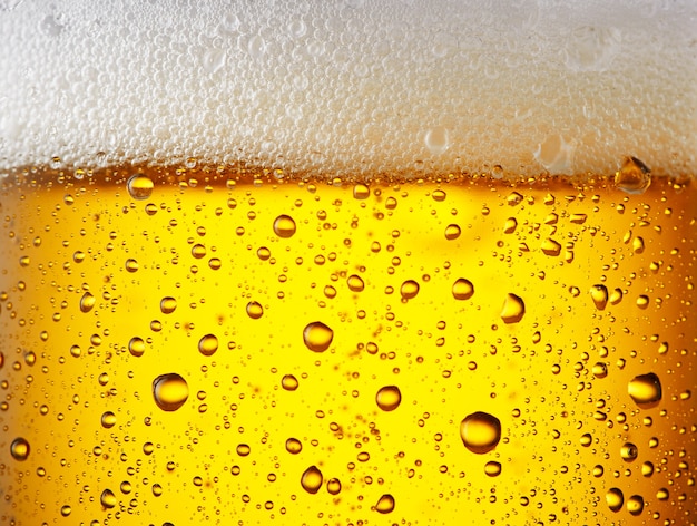 Close up drops of a Ice Cold Pint of Bee