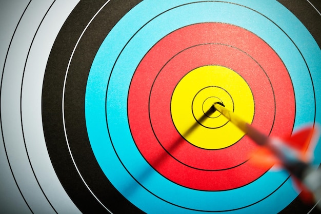 Close-up of arrow on bull-eye