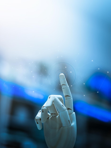 Close-up of artificial hand touching invisible screen
