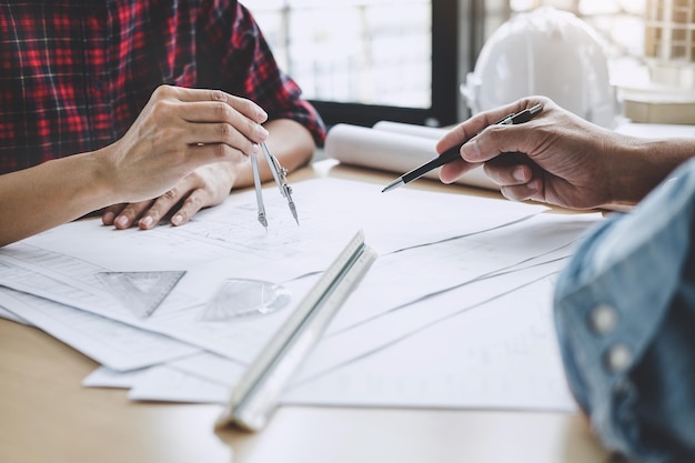 Close-up of business colleagues working in office