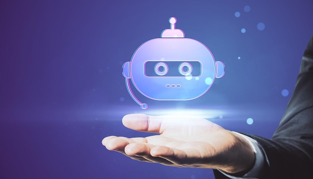 close up of businessman hand holding creative robot hologram on blurry background chat gpt and ai customer support and bot concept
