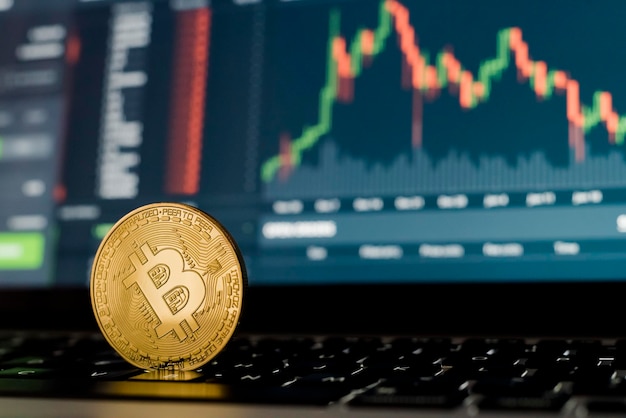 Close-up of coins on laptop