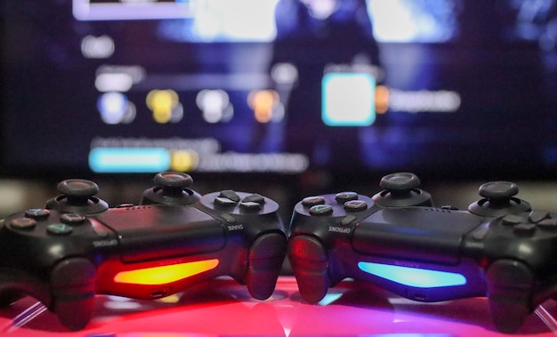 Close-up of game controllers on table