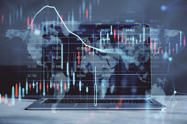 Close up of laptop computer with glowing candlestick forex chart and map hologram on blurry background Stock investment market and money concept Double exposure