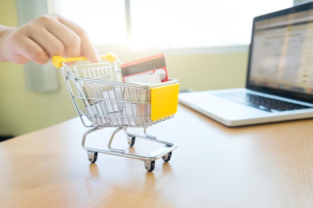 Close-up of man with shopping cart