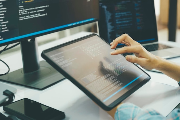 Close up programmer is coding and programming software