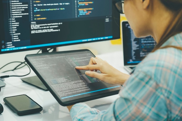 Close up programmer is coding and programming software