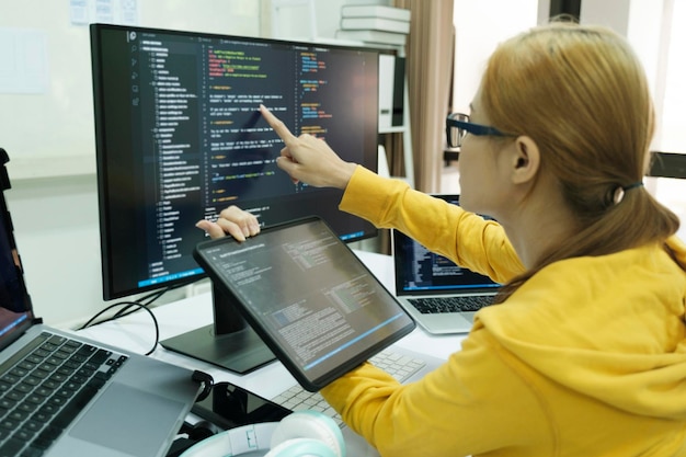 Close up programmer is coding and programming software