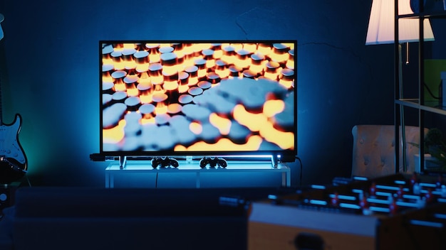 Close up shot of 3D rendered animations running on TV screen in empty house with warm lighting