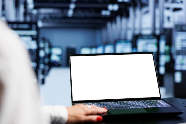 close up shot of mock up laptop used by specialist in server hub delivering massive computing power, capable of processing and storing large amounts of data and controlling network resources