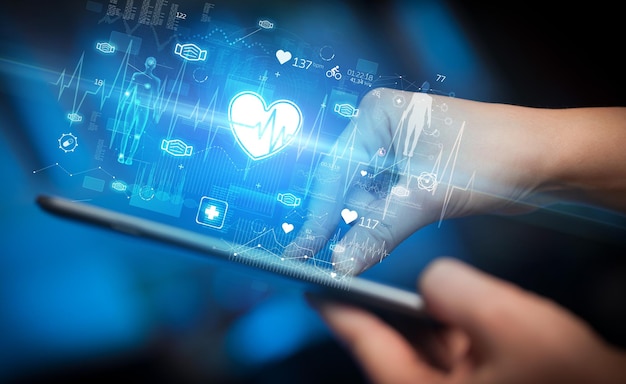 Closeup of a touchscreen with healthcare icons