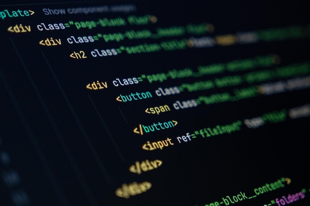 closeup of computer screen with colorful html code focus on div and button elements web development and frontend design