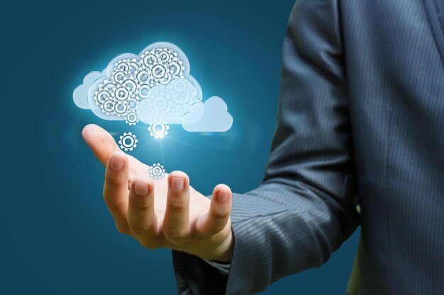 Cloud data in hand on blue background