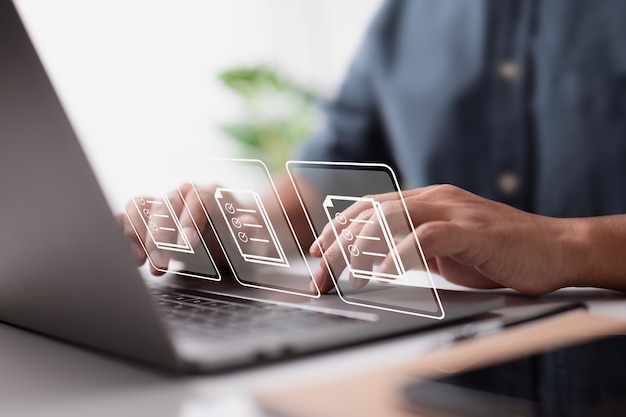 compliance regulations and policies, as well as papers with checkbox lists on a virtual screen.