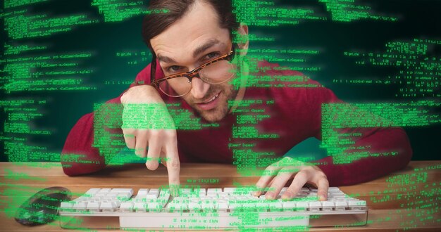 composite image of man wearing eye glasses pointing on computer keyboard