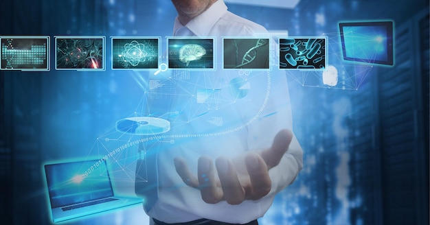 Composition of businessman holding interactive screen with digital icons