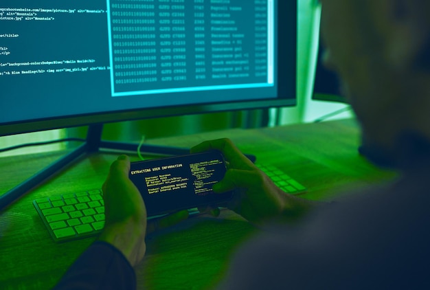 Computer hacker coding and a man with phone for phishing scam or cybersecurity software Online crime smartphone screen and cyber thief person with info for ransomware hacking or malware script