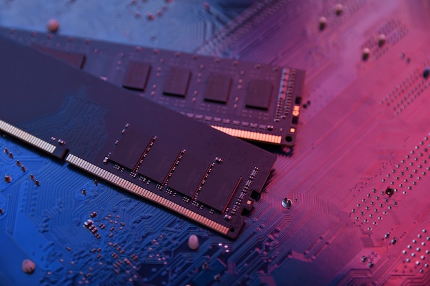 Computer memory RAM on motherboard background . Close up. system, main memory, random access memory, onboard, computer detail. Computer components . DDR3. DDR4. DDR5