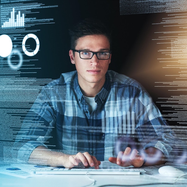 Computer programmer software developer or engineer working on computer database with futuristic CGI graphic data Male information technology coder or a IT programmer coding company cyber security