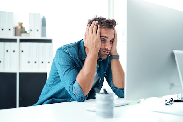Computer reading and man in office stress and virtual assistant in agency anxiety and customer service Advisor depressed and online of info communication and frustrated of business and person