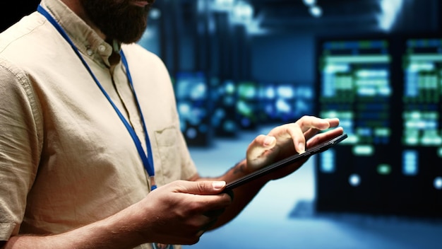 Computer scientist doing maintenance on VPN servers with high security standards used to adequately protect sensitive data Data center providing secure internet connections for users