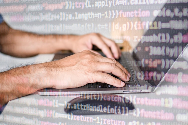 Concept men are coding software using laptops to control audio in recording rooms hackers type codes to steal data from financial institutions around the world Selective focus blurred background