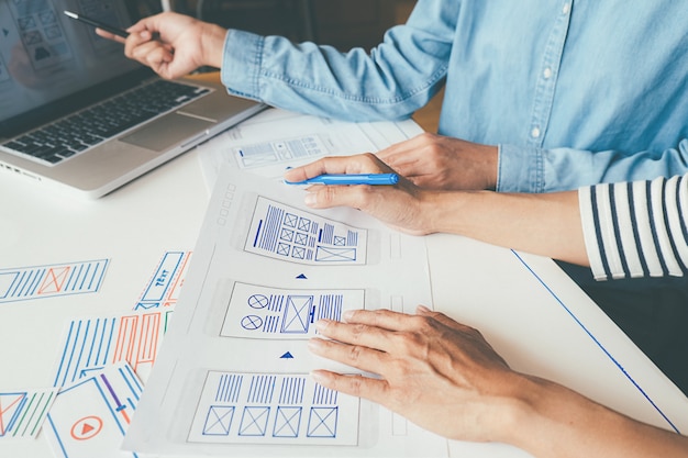 Creative Web Designer planning application and developing template layout 